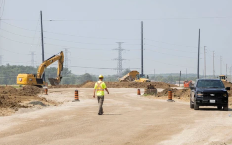 A worker walks at the site of the Volkswagen battery plant in St. Thomas on Wednesday, Aug. 6, 2025. (Derek Ruttan/The London Free Press)