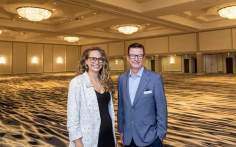 RBC Place marketing manager Joy Gallaiford with general manager Darrin Pollard in the ballroom of DoubleTree by Hilton in London. Photo taken on Thursday, Sept. 25, 2025. (Derek Ruttan/London Free Press)