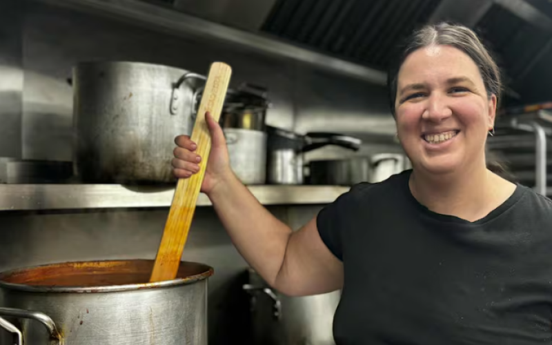 Growing Chefs! Ontario executive chef Katherine Jones prepares a borscht containing beets, potatoes and cabbage ahead of the SOUPer Bowl fundraiser and cooking competition in London, Ont. (Kendra Seguin/CBC News)