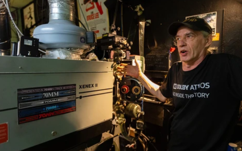 Hyland Cinema projectionist Victor Liorentas shows off their new 70 mm projector in London on Tuesday Oct. 14, 2025. (Mike Hensen/The London Free Press)