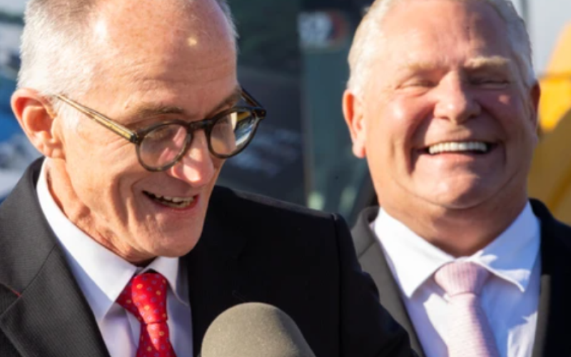 Vianode CEO Burkhard Straube jokes he won’t sing to Doug Ford despite it being the Ontario premier's birthday as they joined other officials to detail the Norwegian firm's $3.2-billion investment in a St. Thomas plant. Photo taken in St. Thomas on Thursday Nov. 20, 2025. (Mike Hensen/The London Free Press)