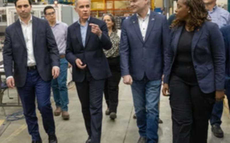 Prime Minister Mark Carney tours the Armo Tool and Abuma Manufacturing plant with company president and CEO Ben Whitney in London on March 26, 2025. Carney was accompanied by Liberal MPs Peter Fragiskatos and Arielle Kayabaga. Derek Ruttan/The London Free Press/Postmedia Network