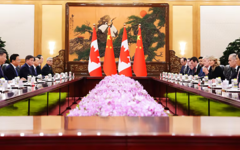Prime Minister Mark Carney, second from right, and his delegation meets with Chinese President Xi Jinping, far left, and his delegation in the Great Hall of the People in Beijing, China, on Friday. (Sean Kilpatrick/The Canadian Press)