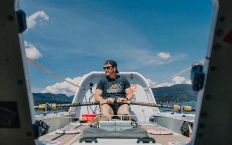 Kyle Wills sits in his 26-foot rowing boat, which he will use in his race across the Atlantic Ocean. (Jack Madeley photo)