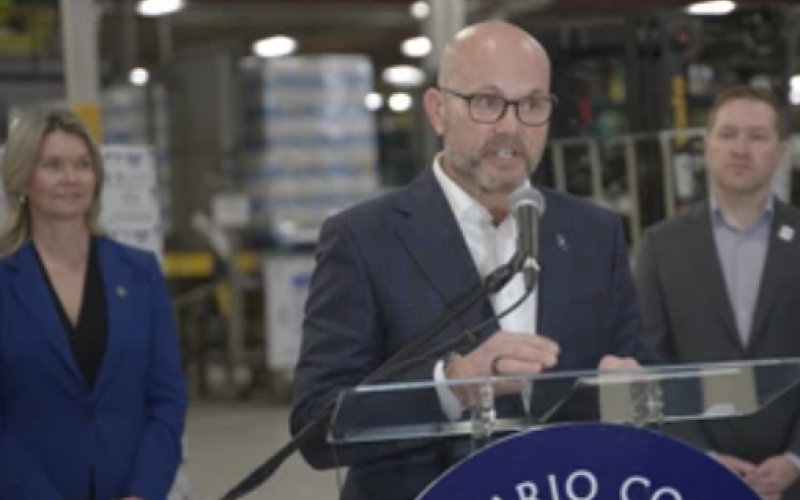 Jeff Ryan of Labatt Breweries speaks during a press conference announcing the company's decision to join the Ontario Corps program. Behind him are Jill Dunlop, the province’s minister of emergency preparedness and response, and London Mayor Josh Morgan. Photo taken on Feb. 20, 2026. (Jonathan Juha/The London Free Press)