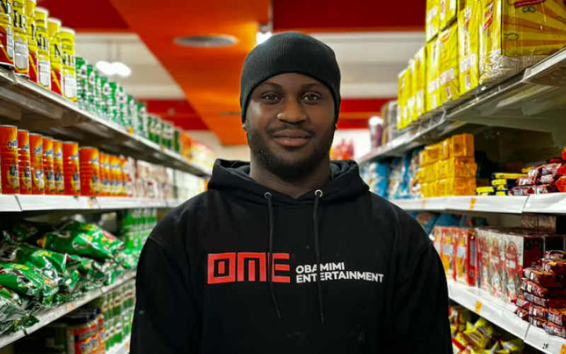 Payless Afro International Food Market manager Ade Bolajietaiwo says the store is more than a place to buy groceries. He says many members of London's Black communities use the shop as a gathering place. (Kendra Seguin/CBC News)