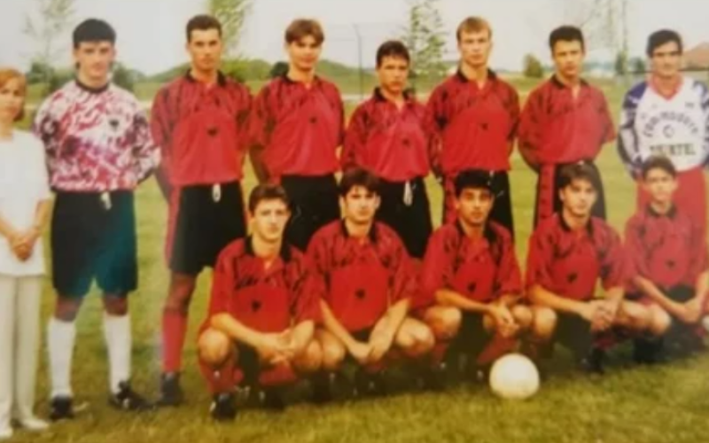 A team photo shows members of an Albanian soccer team that came to London to play in a soccer tournament in 1995. The boys, team coach Luka Shaqiri, back row right, his spouse Jeni Duro, back row left, and their 11-year-old son Amarildo, front row right, chose not to return to Albania because of turmoil in the country and applied for refugee status. (Supplied)