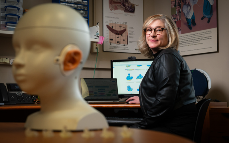 Susan Scollie, audiologist, professor in the Faculty of Health Sciences and lead investigator on the ALLEars Project, in her Innovations in Hearing Technologies Lab at Western University. (Iulia Costache/Western Health Sciences)