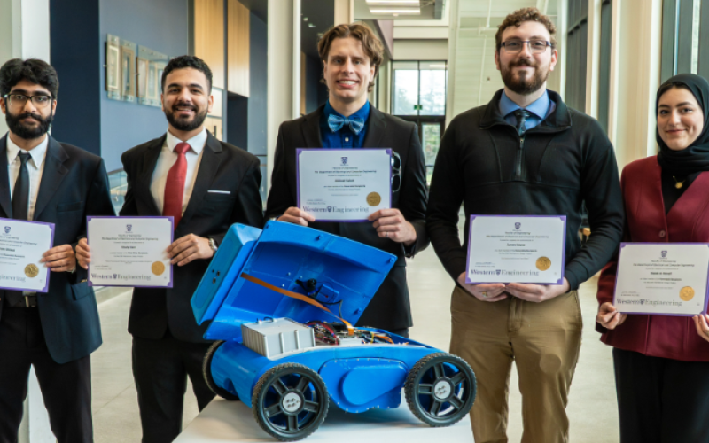 Fourth-year engineering students developed a fully autonomous robotic lawn mower as their capstone project, an innovative product designed to make lawn care safer, more accessible and less time-consuming. (L to R) Pedram Ghiassi, Hamza Aldraimli, Aliaksei Kabak, James Keane and Malak Al-Hanafi. (Jacob Arts/Western Engineering)
