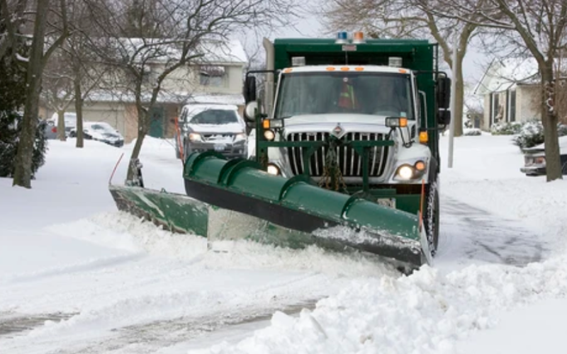 A City of London snowplow clears residential streets in London in this file photo. (Free Press files)