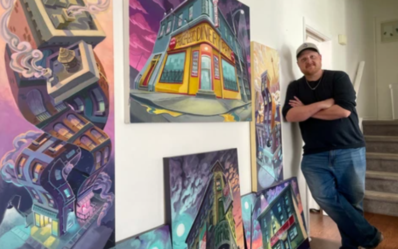Artist Tommy Bradnam was photographed among several of his paintings in his London home on April 30, 2026. (Ryan Goodison/The London Free Press)