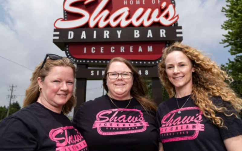 From left to right, sisters Kim McCutchen, Kristine Hayes and Kelly Heleniak, the owners of Shaw’s Ice Cream, pose for a photo outside the landmark Port Stanley-area dairy bar on Wednesday, June 10, 2026. Geoff Robins/The London Free Press