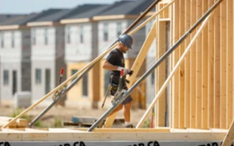 Jamie Daugharty of Willow Bridge Construction works on framing a new house near Wharncliffe Road south in London. (Free Press file photo)
