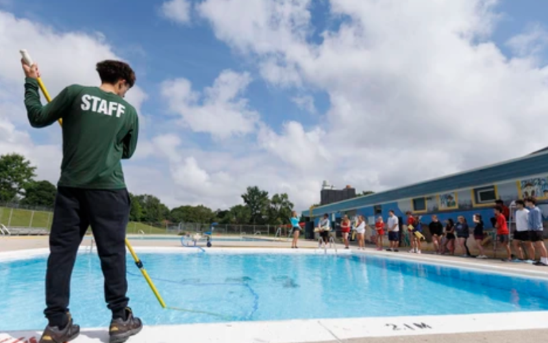 Nate Antunes-Murphy vacuums the pool at the Oakridge Recreation Centre in London on Friday, June 26, 2026. London’s outdoor pools open Saturday for the summer. (Geoff Robins/The London Free Press)