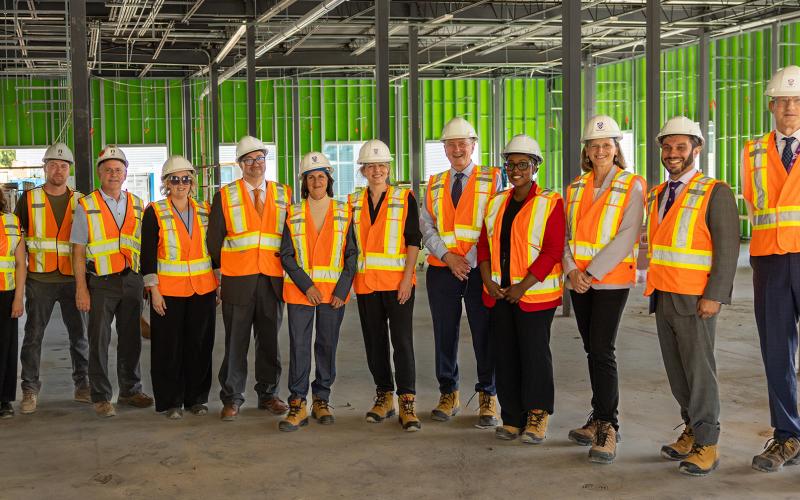 Federal Industry Minister Mélanie Joly, centre, visits the future home of the Pathogen Research Centre during a trip to Western University on July 7, 2026. (Steven Anderson/Western Communications)