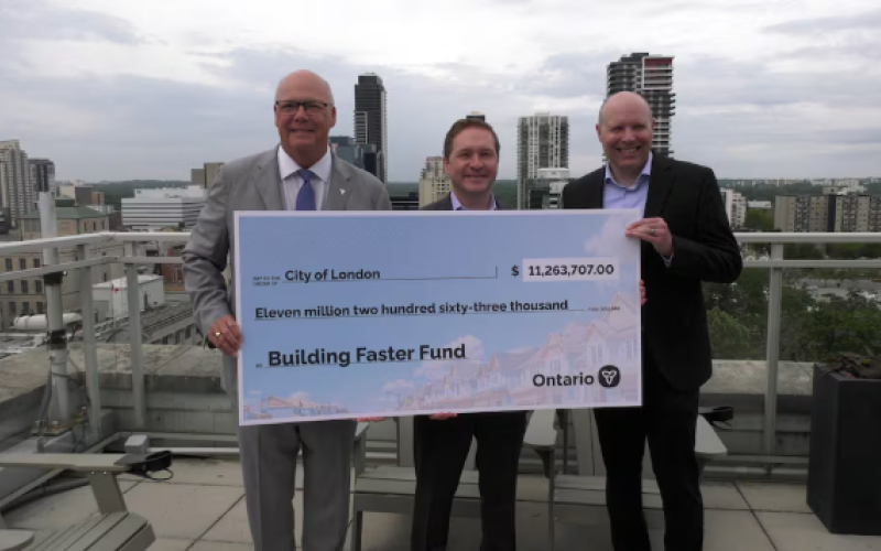 Elgin-Middlesex-London MPP and Ontario Minister of Municipal Affairs Rob Flack (L) with London Mayor Josh Morgan and Deputy City Manager Scott Mathers (R). July 6, 2026. (Gerry Dewan/CTV News London)