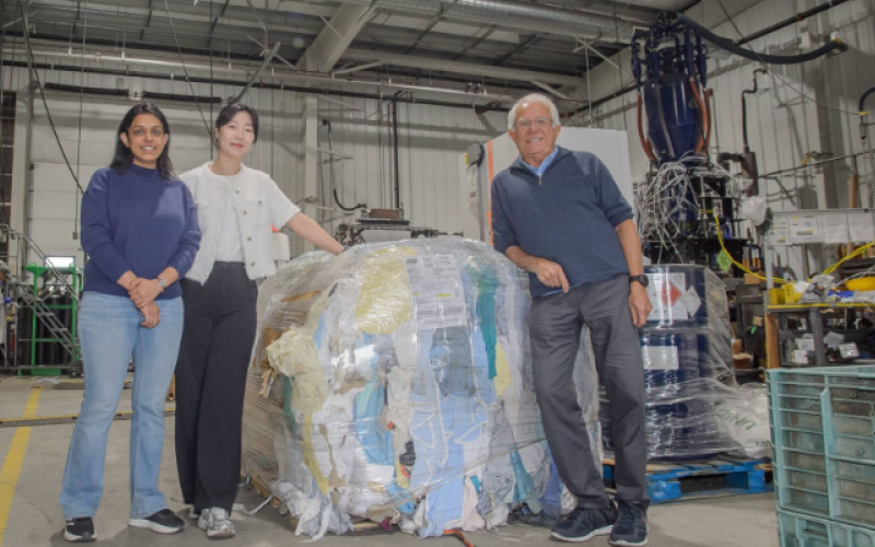 Western has partnered with Goodwill to tackle textile waste. Researchers involved in the ICFAR project include, (L to R) Neha Batta, postdoctoral research fellow, and Heejin Lee, postdoctoral research associate, with Franco Berruti, ICFAR director. (Christopher Kindratsky/Western Communications)