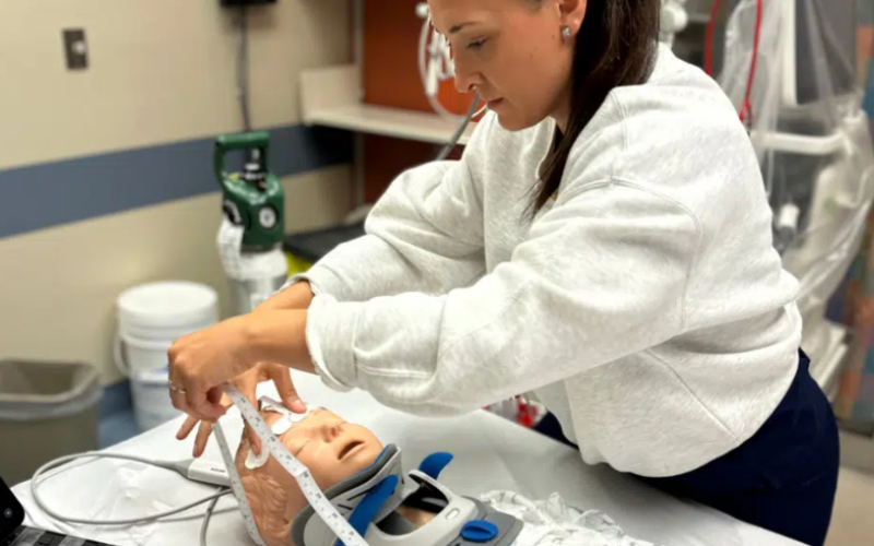 Susie Beres completes a simulation of a bedside assessment for the purposes of a study.