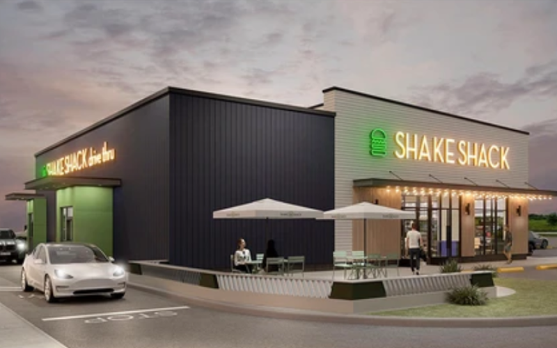 A rendering shows the planned Shake Shack location at 3275 Wonderland Rd. S., set to open in 2027 with the chain’s first Ontario drive-thru. (Provided by Shake Shack)