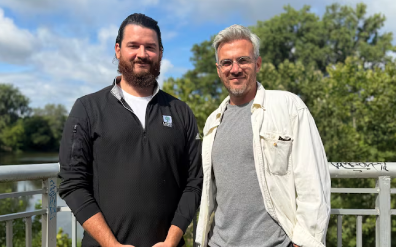 City of London staff Mike Macaulay and Ryan Craven visit the Forks of the Thames River, which serves as a focal point for London's River District. The city is jumping on the formerly community-driven movement as part of its Downtown Plan. (Kendra Seguin/CBC News)