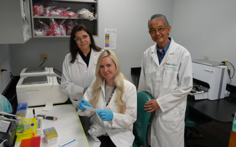 Dr. Victor Han, Cristiana Losef and Jessica Wilson at the Olink lab at the Children's Hospital in London, Ont. (Children's Health Foundation)