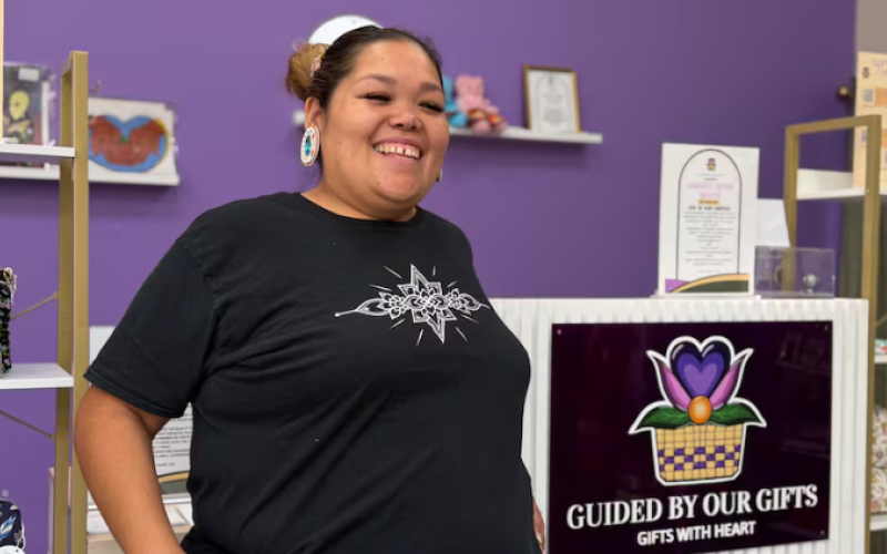 Kathleen Doxtator is the owner and an artist at Guided by Our Gifts, a new pop-up shop in White Oaks Mall that features products by Indigenous vendors. (Kendra Seguin/CBC News)