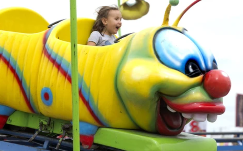 Addison Granger, 5, of Kincardine rides the Wacky Worm roller coaster on the opening day of the 143rd Western Fair in London on Friday, Sept. 7, 2018. (Free Press file photo)