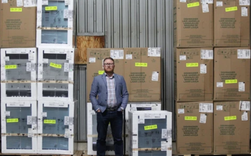 London Major Appliances general manager Jay Vanderhoeven stands in front of appliances being stored at the company's warehouse at 312 Sovereign Rd. on Thursday, Sept. 10, 2026. (Dale Carruthers/The London Free Press)