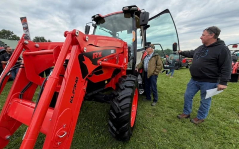 Kevin Cron, right, and his father, Bill, check out a tractor at Canada’s Outdoor Farm Show in Woodstock on Tuesday, Sept. 15, 2026. (Jonathan Juha/The London Free Press)