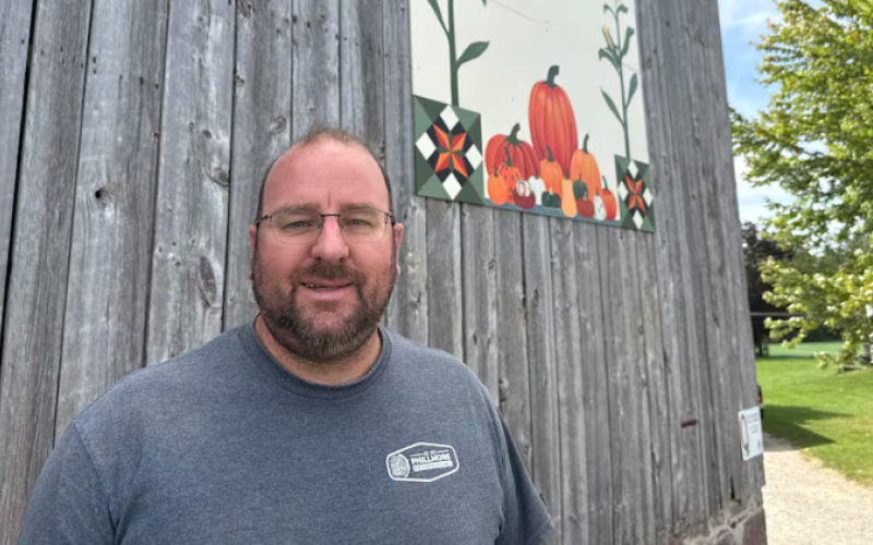 Ian Phillips is a partner at Phillips' Family Farms, which grows pumpkins and sweet corn. He says dry weather caused some problems for corn yields, but the pumpkins are growing nicely. (Jack Sutton/CBC)