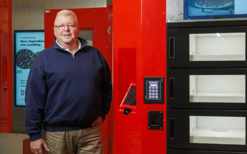 Appetronix Co-Founder Ray Schott stands with the company's pizza making robot at their in London, Ont. on Tuesday, October 6, 2026. (Geoff Robins/The London Free Press)