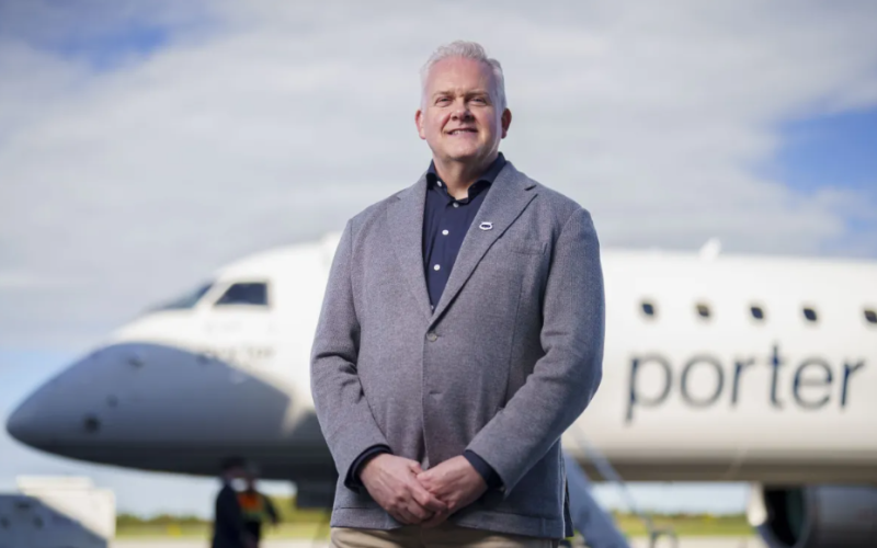 Porter Airlines president Kevin Jackson poses in front of an Embraer E195-E2 following the announcement of new domestic routes from London International Airport on Tuesday, Oct. 6, 2026. (Geoff Robins/The London Free Press)