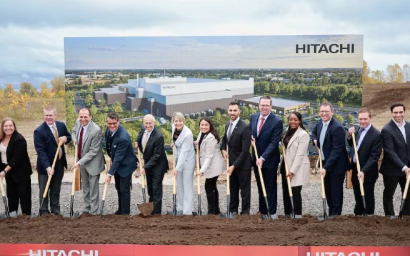 Industry Minister Melanie Joly, sixth from left, and Ontario Energy Minister Stephen Lecce, sixth from right, join Hitachi Energy executives to break ground on a new $479-million transformer insulation factory in London, Ont., in a Friday, Oct. 16, 2026, handout photo. THE CANADIAN PRESS/Handout — Hitachi Energy Canada