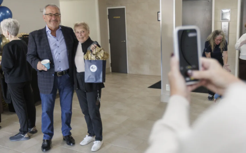 Joe Carapella, founder and owner of Tricar, poses for a picture with Carmel St. Amour, a longtime resident of Tricar's building Westmount Place at 800 Wonderland Rd. S. Photo taken in London on Tuesday, Oct. 20, 2026. (Geoff Robins/The London Free Press)